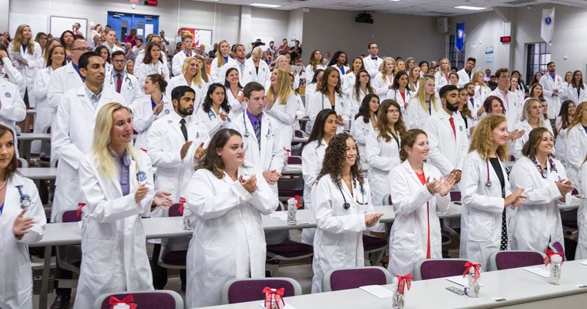 Welcoming the RUSVM Class of 2022 New RUSVM students at White Coat