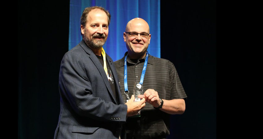 Adtalem Global Education Earns "Best in Show" Award for Simulation in Healthcare Eric Bauman and Jon Brouchoud winning award
