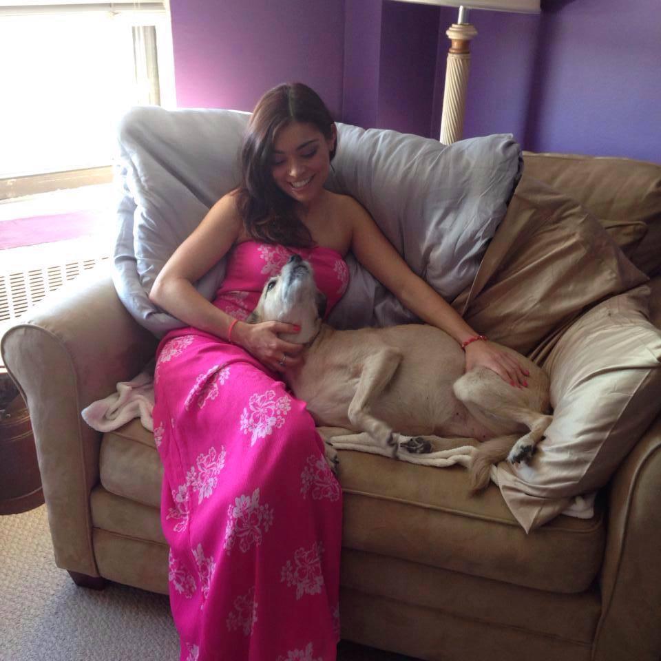 Woman on couch with large dog