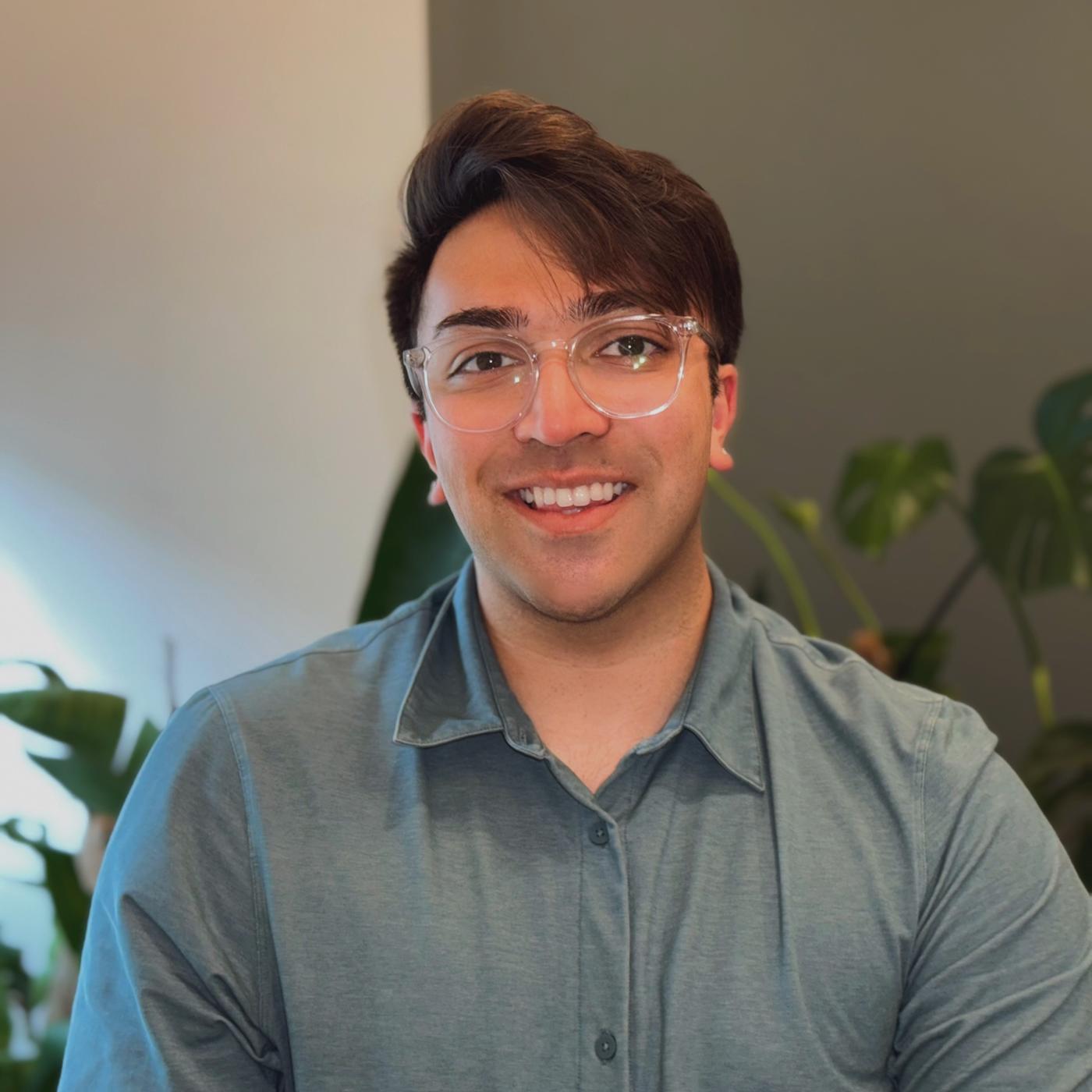 Rohan Patel’s, MD ’20, MPH smiling with glasses on