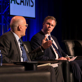 Professionals speaking on a panel at ACAMS event