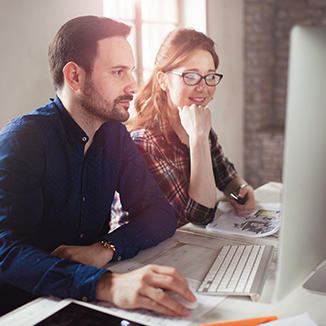 Two students at a computer
