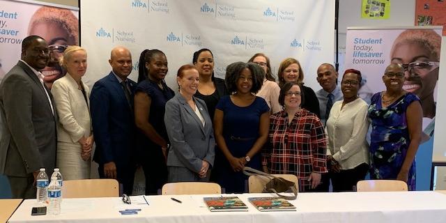 Group of leaders at signing ceremony