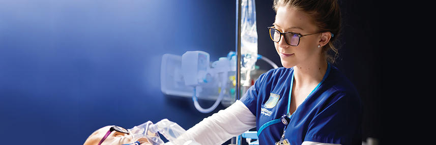 Nursing student with a patient