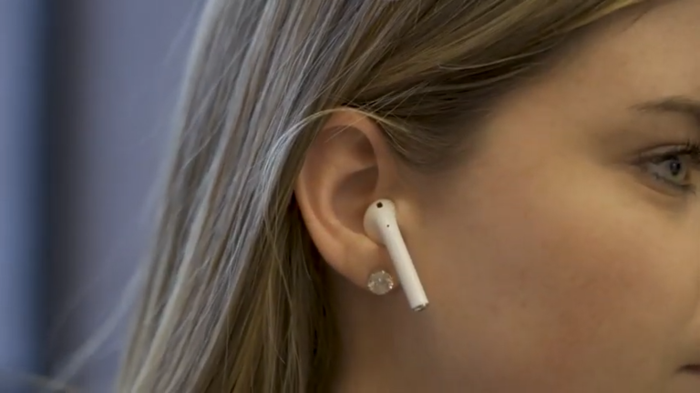 woman with earpod in ear