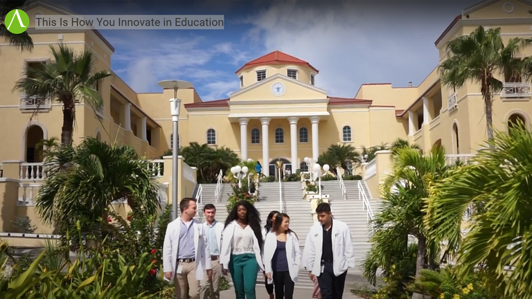 video still of medical students walking from building