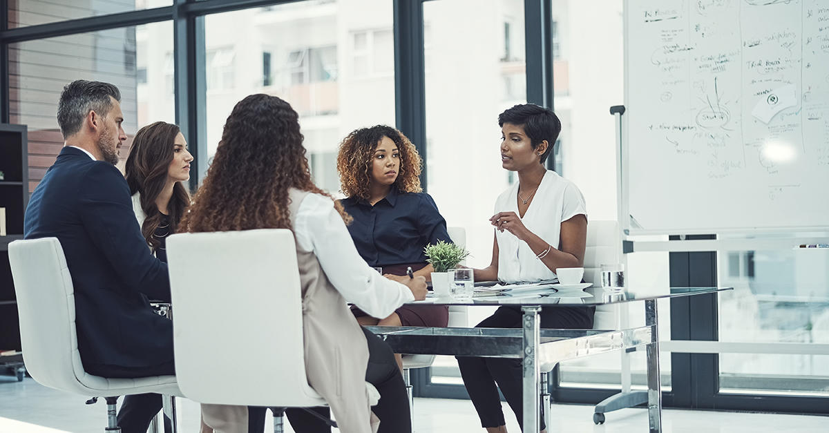 A diverse group of people in a meeting