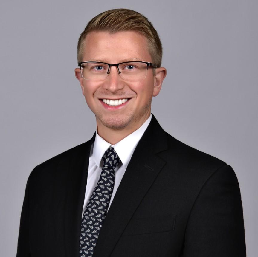 a headshot of Dr. Brandon Szwydky