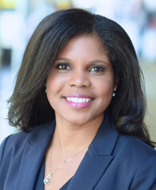 a headshot of Dr. Nadine Spring