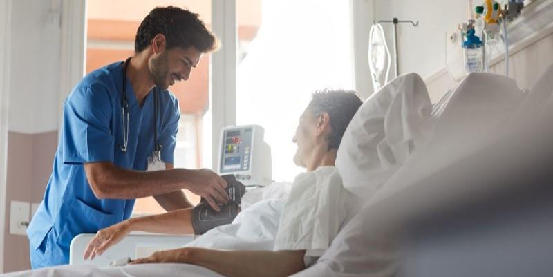 a nurse working on a patient