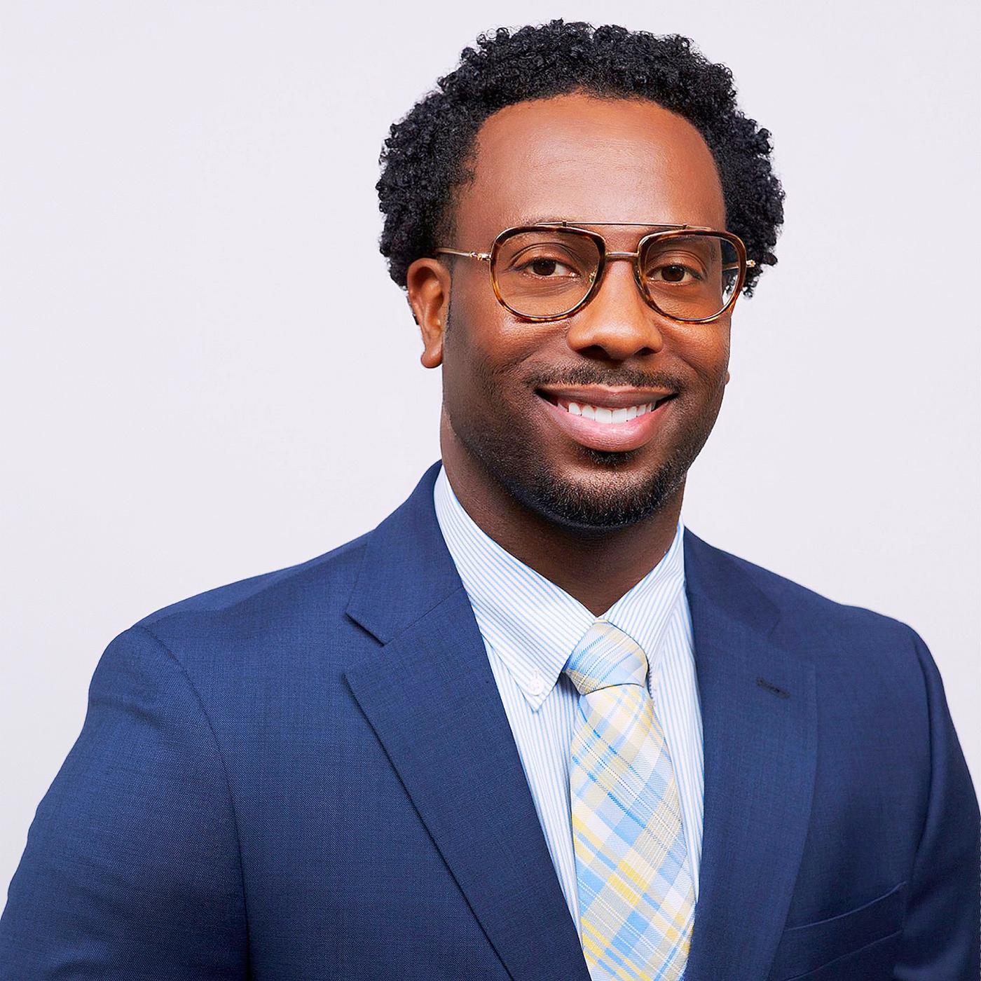 a headshot of Dr. Touissant Battley