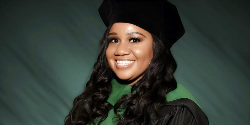 Woman in graduation regalia