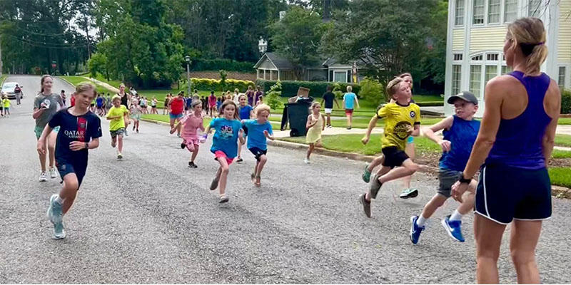 Kids running on a street