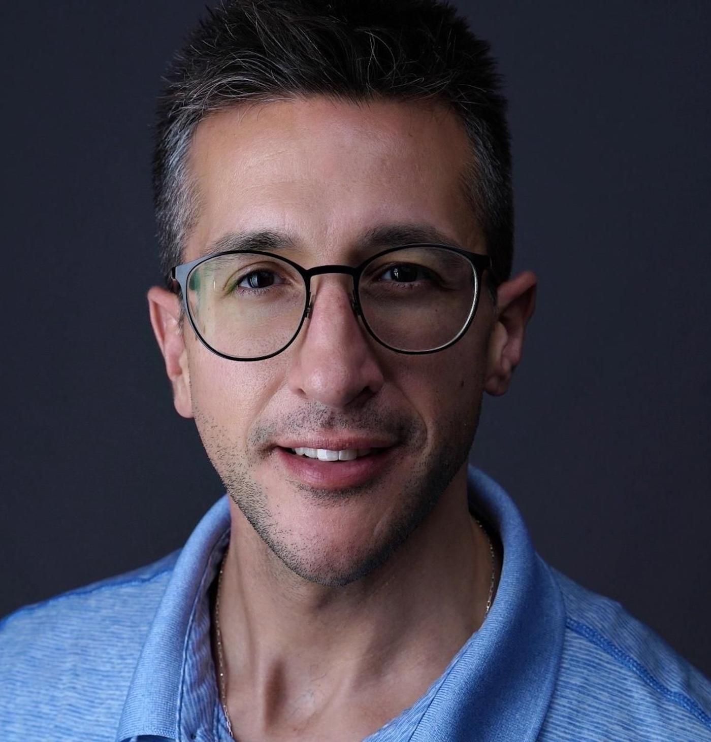 a headshot of Chris Wojnar, Chamberlain University alumnus