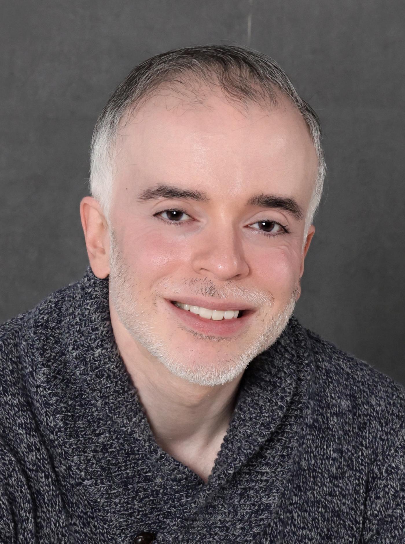 a headshot of Dr. Dhaval Desai, AUC alumnus