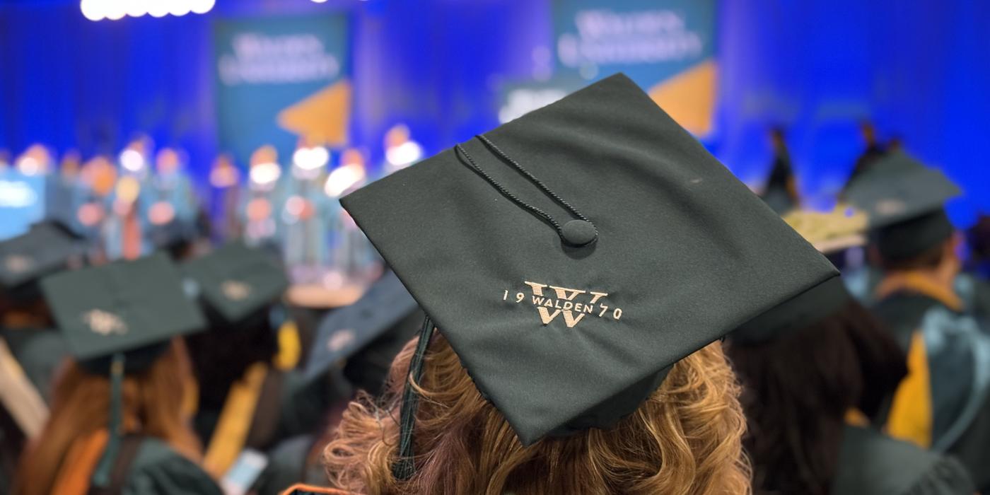 a graduation cap with the Walden University logo