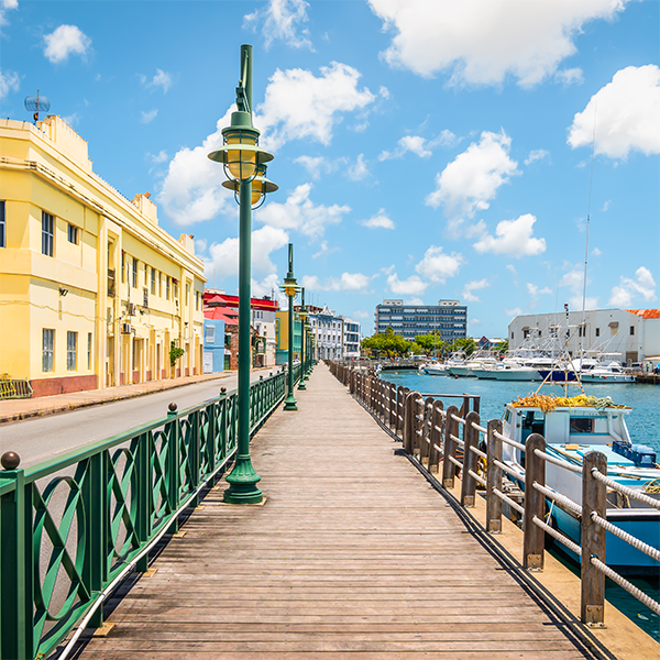 Barbados walkway along water near boat