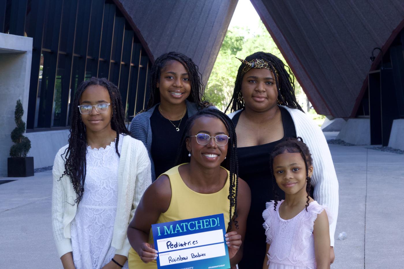 Stephanie Mbionwu celebrating Match Day with her siblings