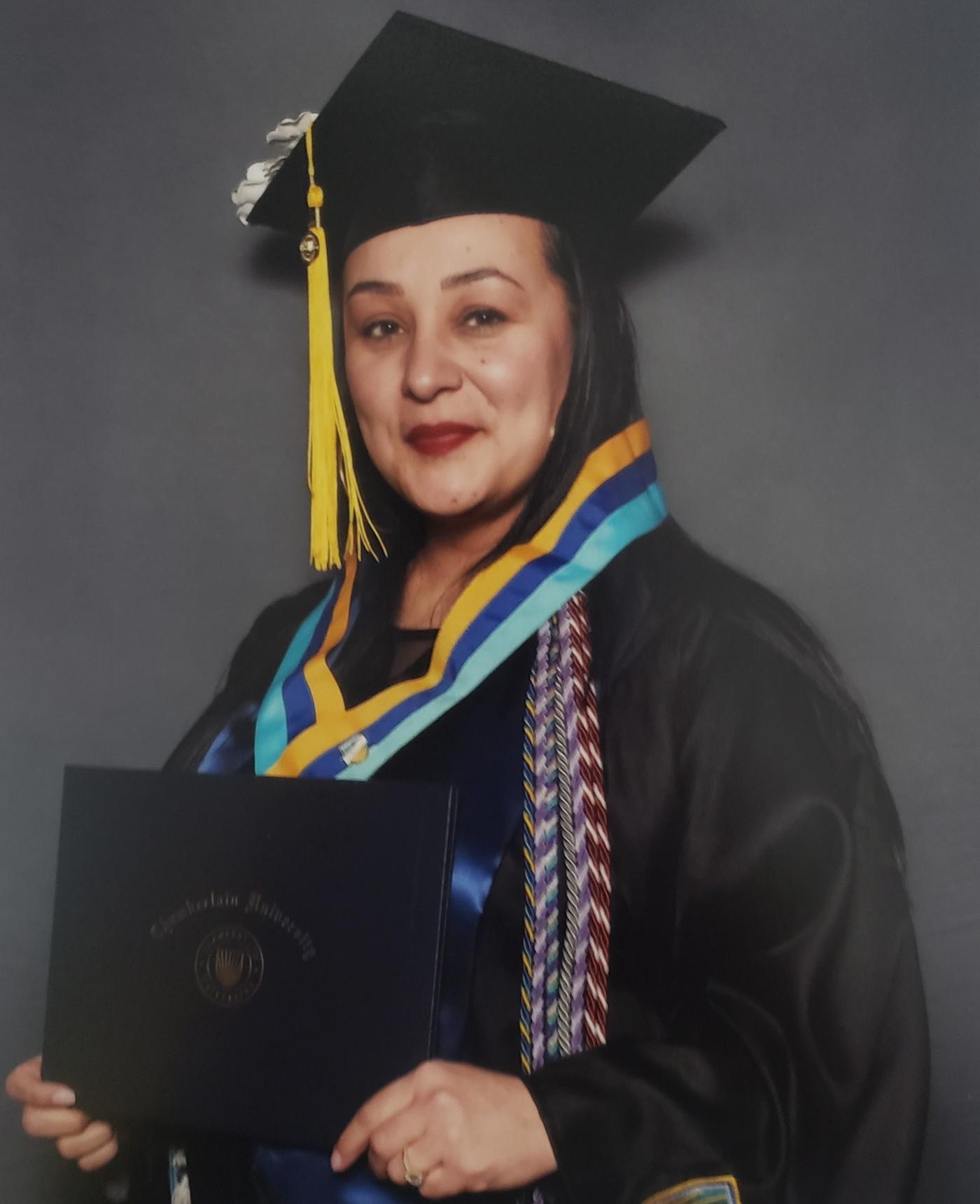 Viviana in her regalia at Chamberlain commencement