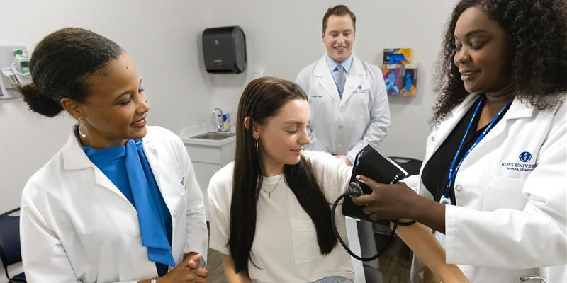 a female patient with three medical professionals
