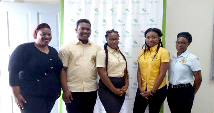 student team posing in front of a backdrop